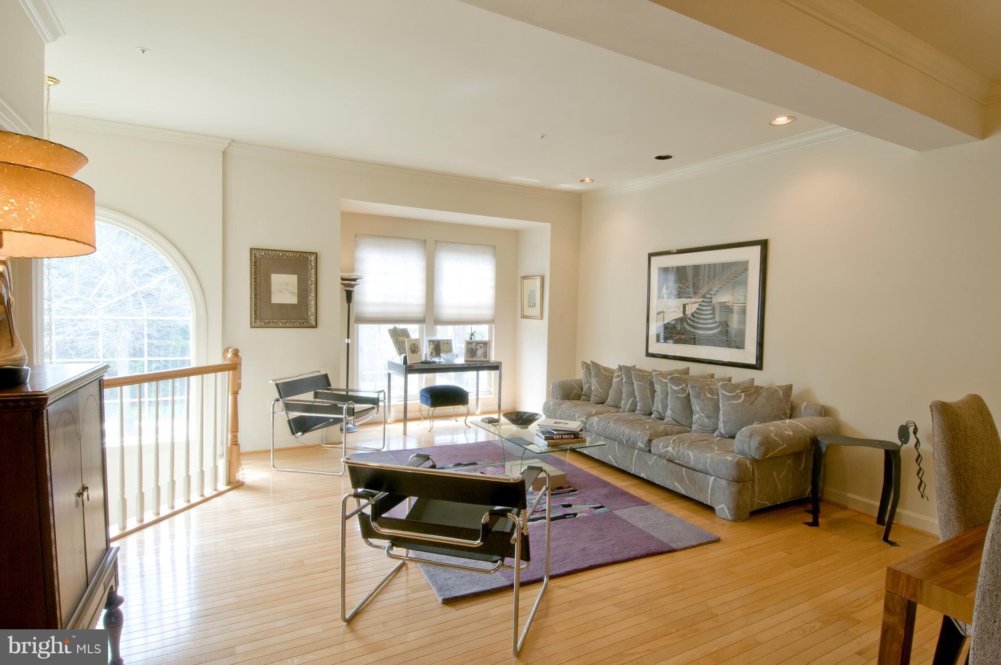 14205 Plum Run Way Silver Spring, MD 20906 - Photo 7 of 29 Large living room w/hardwood & lots of light