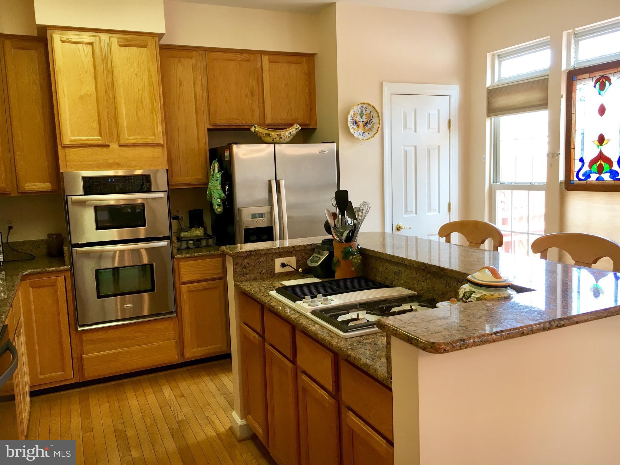 14205 Plum Run Way Silver Spring, MD 20906 - Photo 10 of 29 Kitchen w/granite & stainless