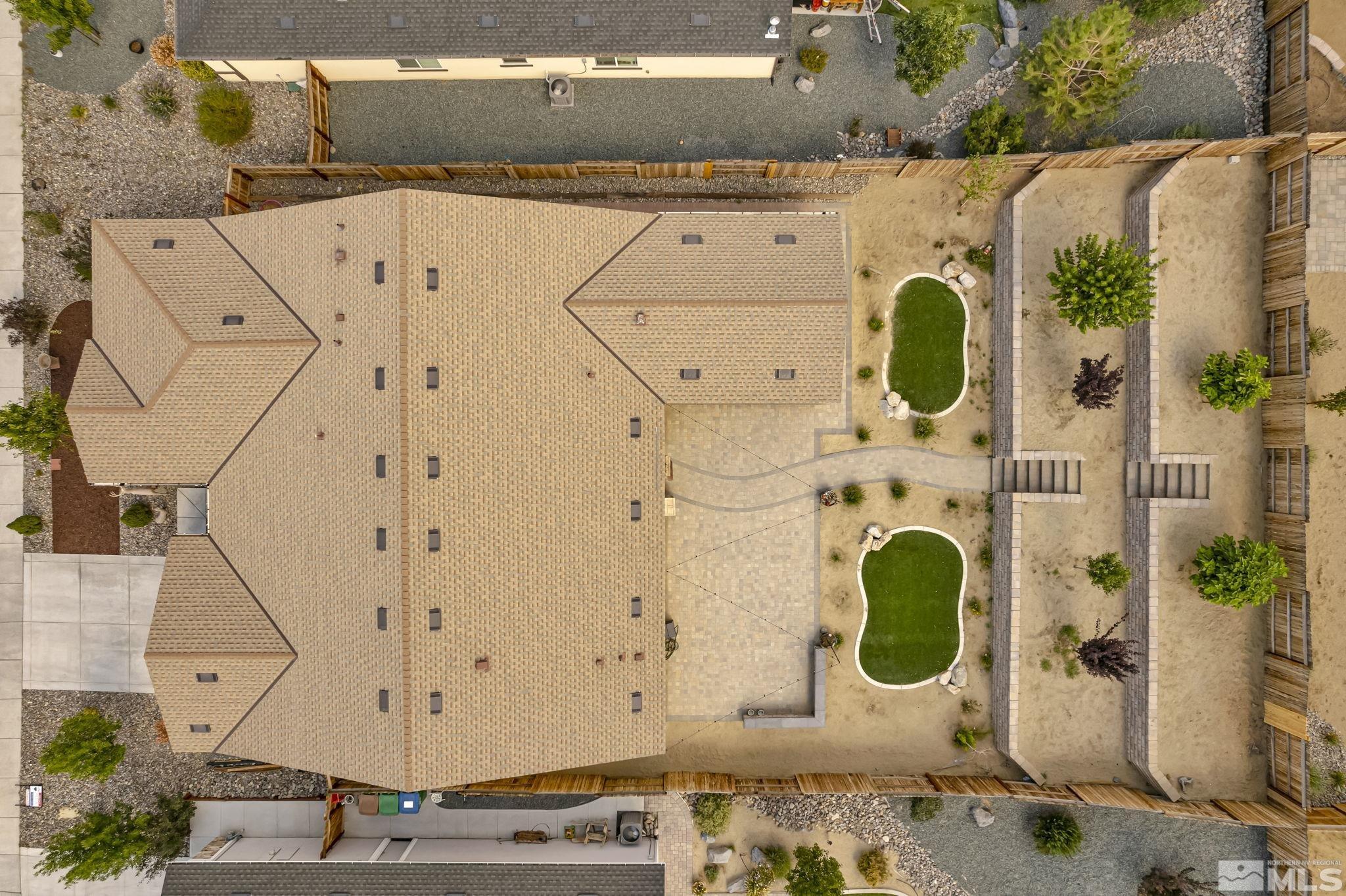 6508 Copper Mountain Drive Carson City, NV 89701 - Photo 21 of 40 a close up of a fireplace with paintings on the wall