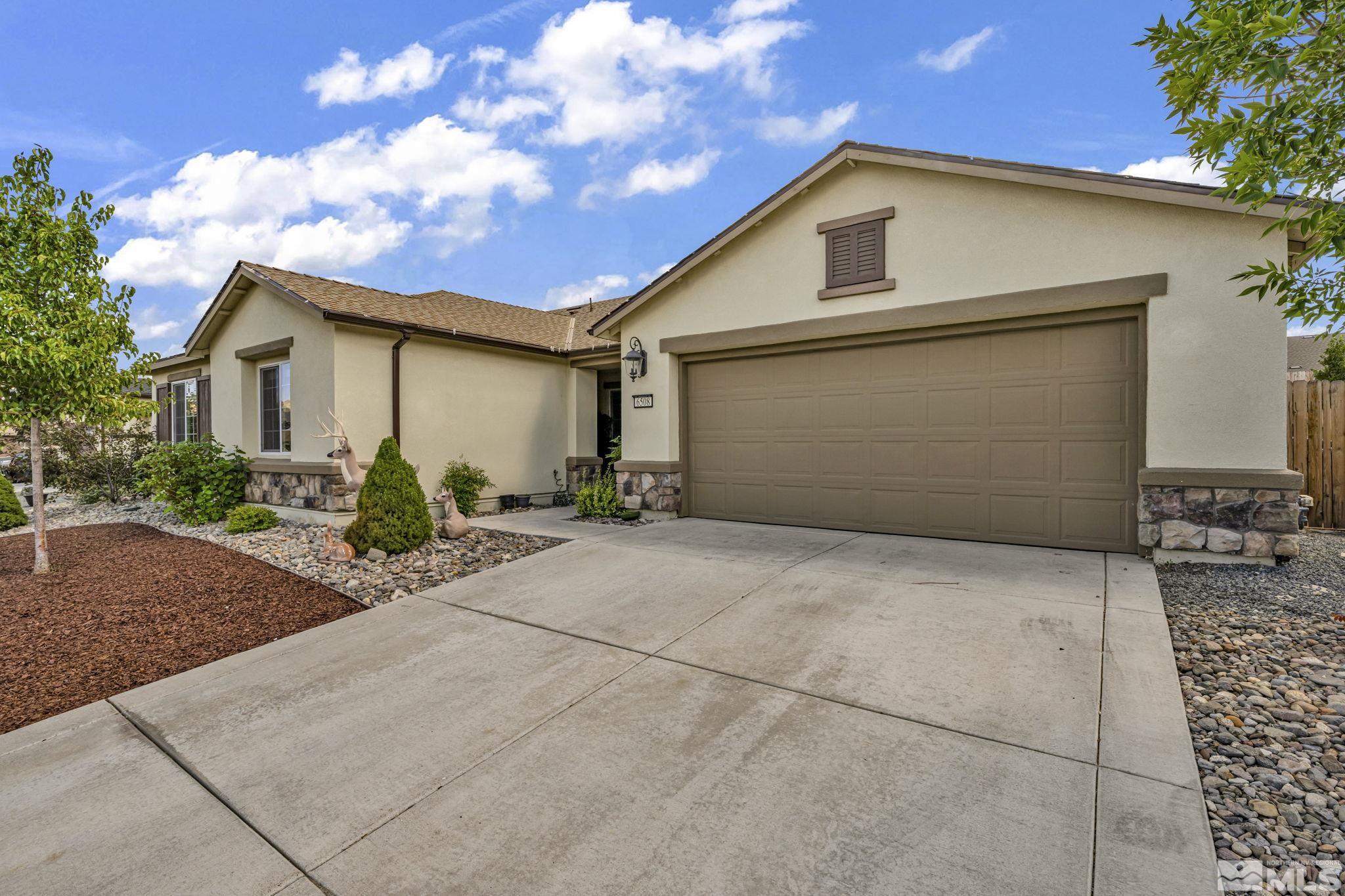 6508 Copper Mountain Drive Carson City, NV 89701 - Photo 28 of 40 a front view of a house with garden