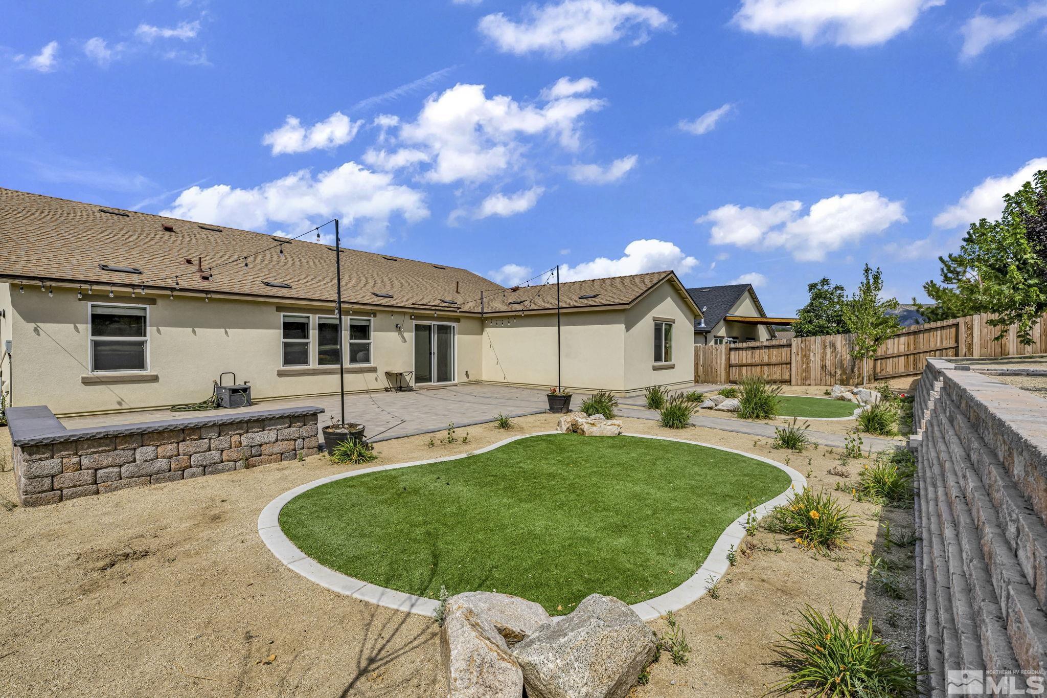 6508 Copper Mountain Drive Carson City, NV 89701 - Photo 33 of 40 a front view of a house with garden