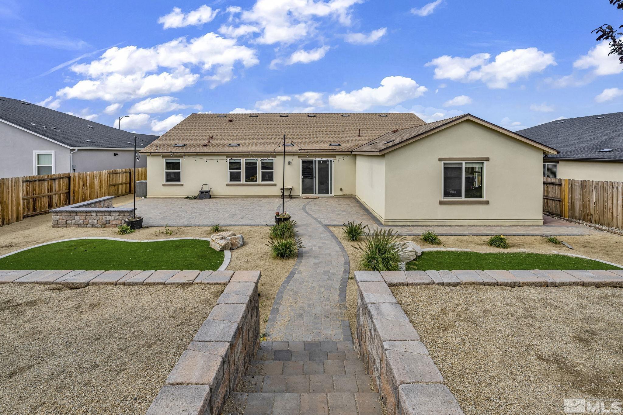 6508 Copper Mountain Drive Carson City, NV 89701 - Photo 34 of 40 a house view with a garden space