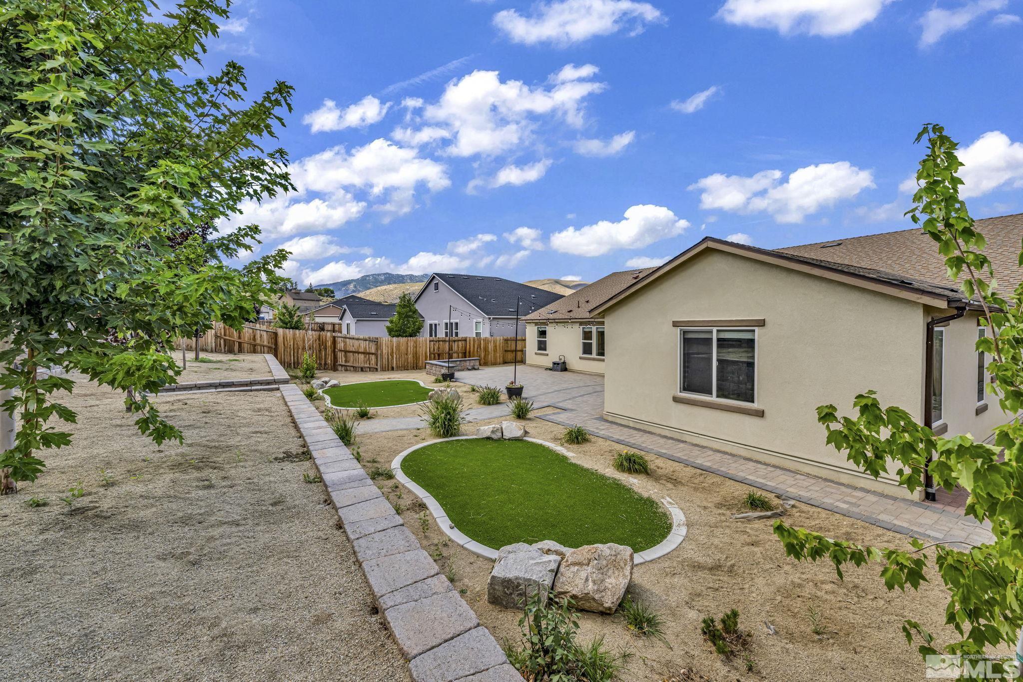 6508 Copper Mountain Drive Carson City, NV 89701 - Photo 35 of 40 a house view with a garden space