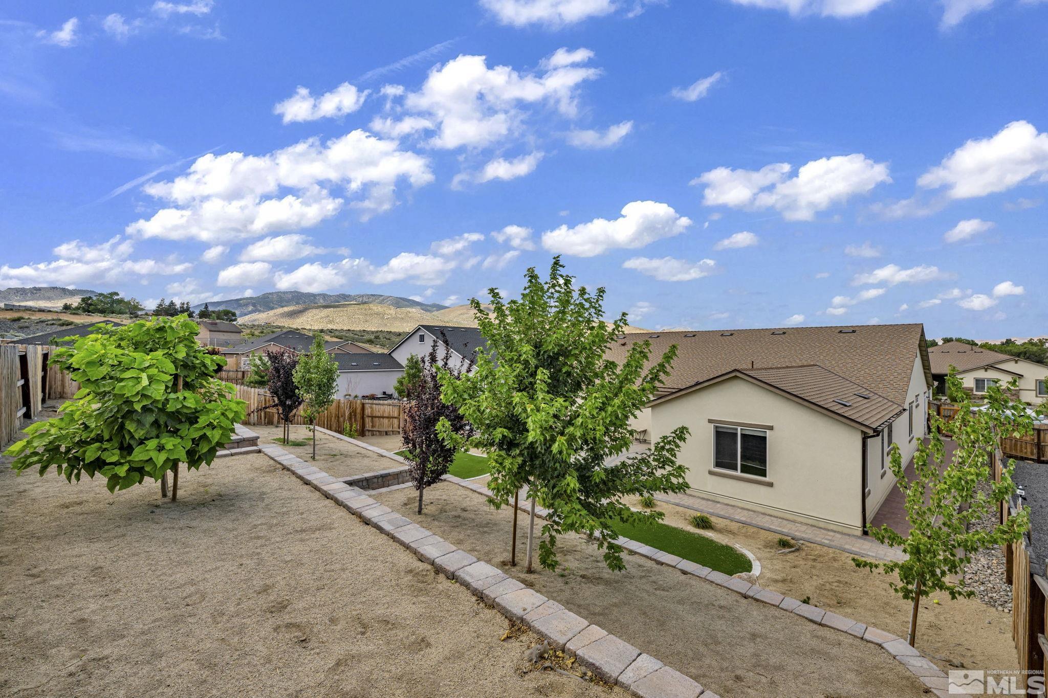 6508 Copper Mountain Drive Carson City, NV 89701 - Photo 38 of 40 a view of a house with a street