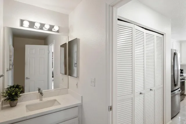 a spacious bedroom with a bed and window