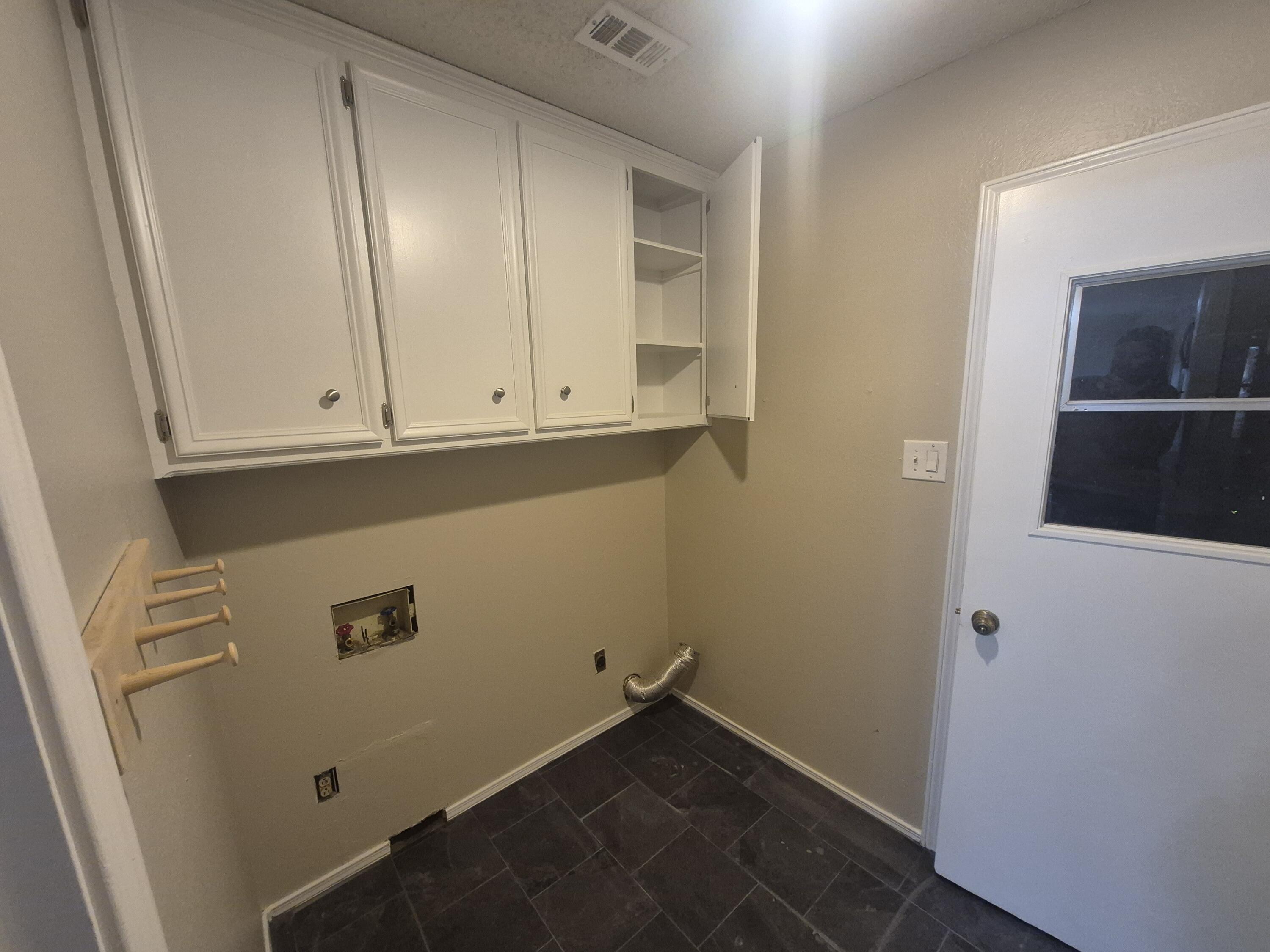 3211 94th Street Lubbock, TX 79423 - Photo 9 of 24 a view of cabinets
