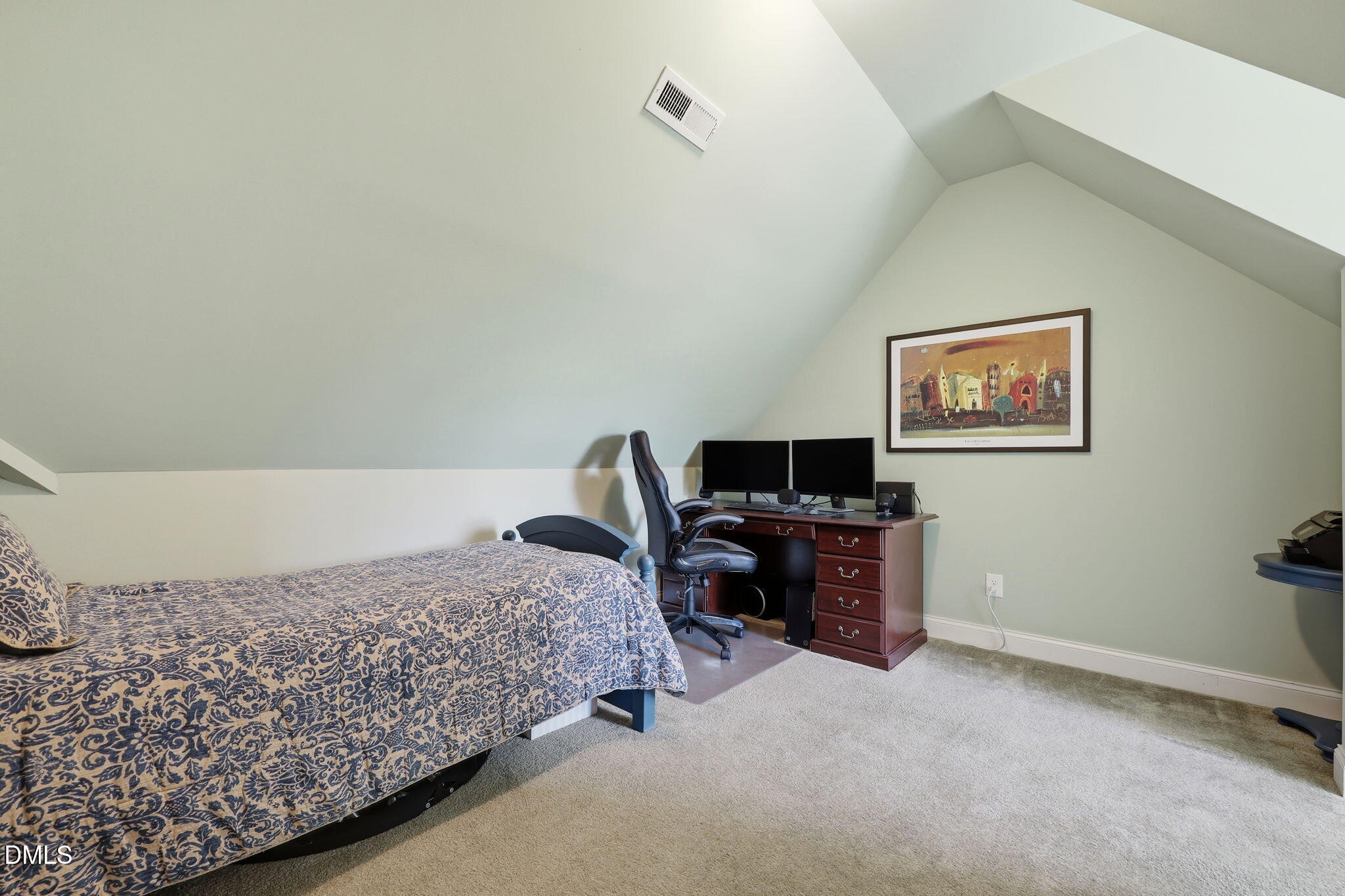 7040 Dayton Ridge Drive Apex, NC 27539 - Photo 27 of 38 a bedroom with a bed and a flat screen tv