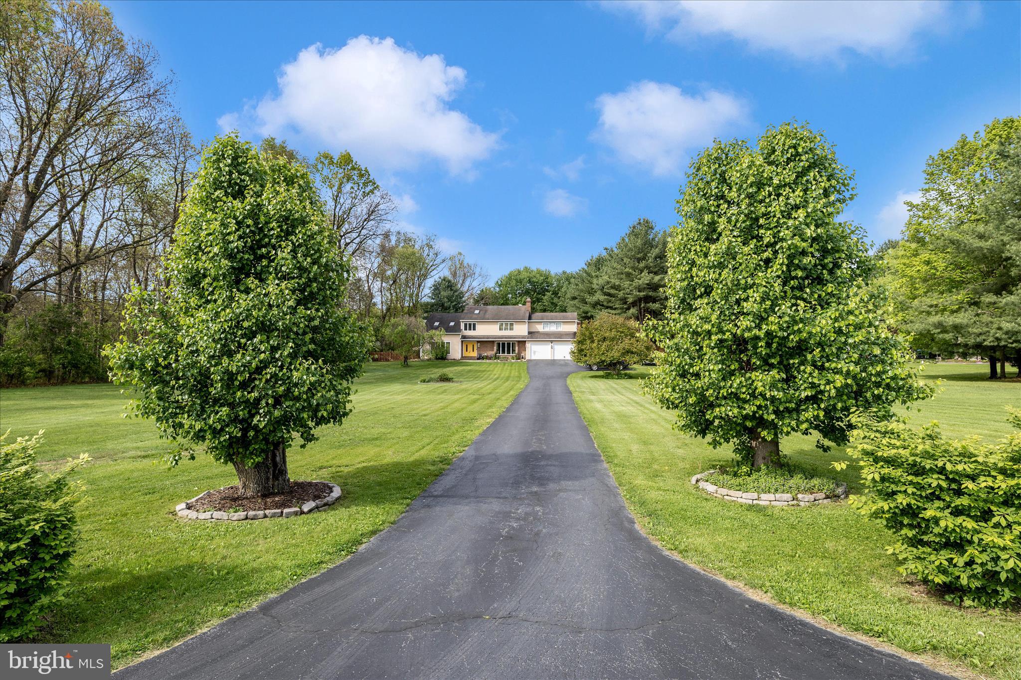 15749 Spade Road Hagerstown, MD 21740 - Photo 1 of 23 a view of a garden with a fountain