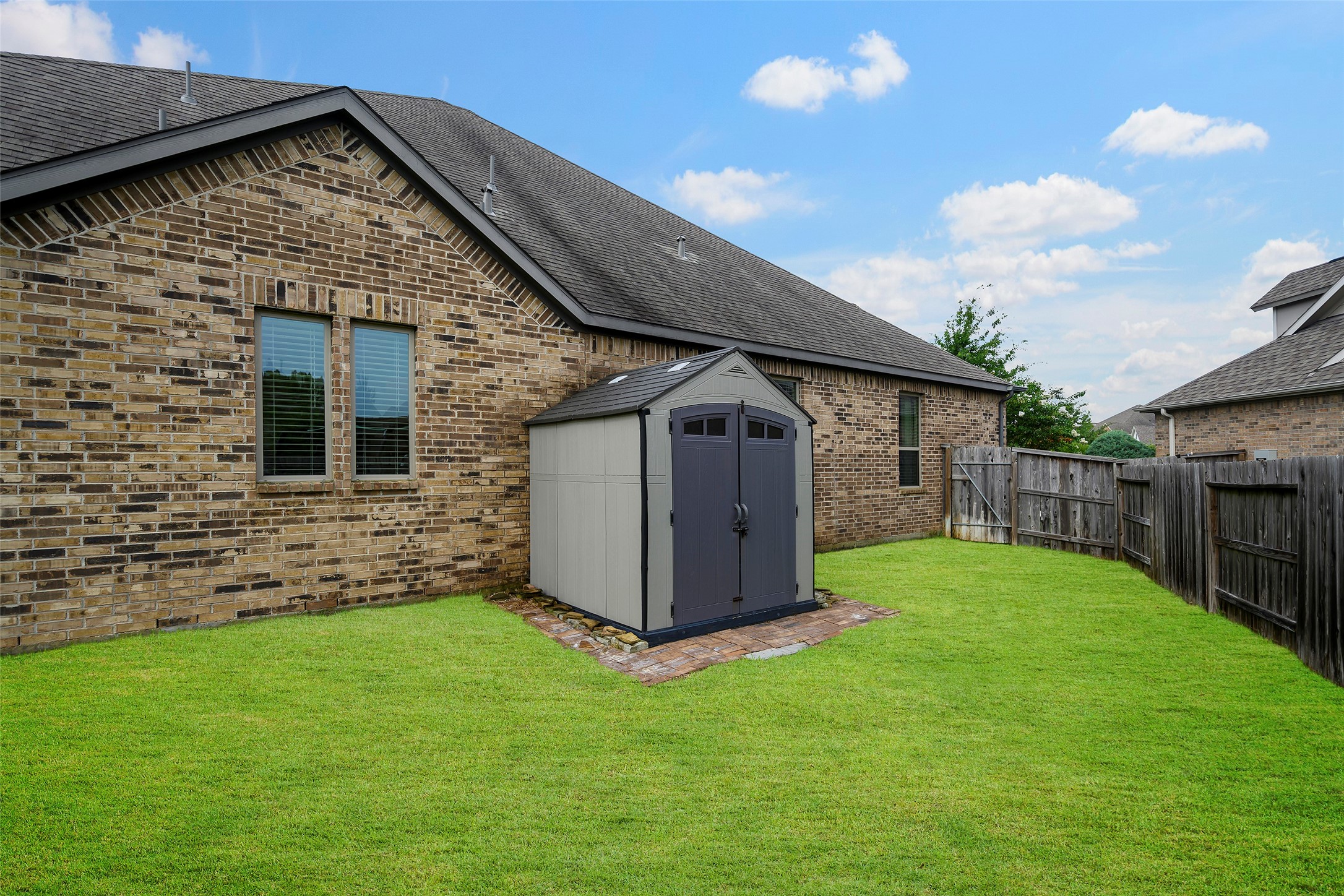 20330 Rosegold Way Spring, TX 77379 - Photo 42 of 48 Storage shed provides convenient space for lawn equipment, tools, and seasonal storage.