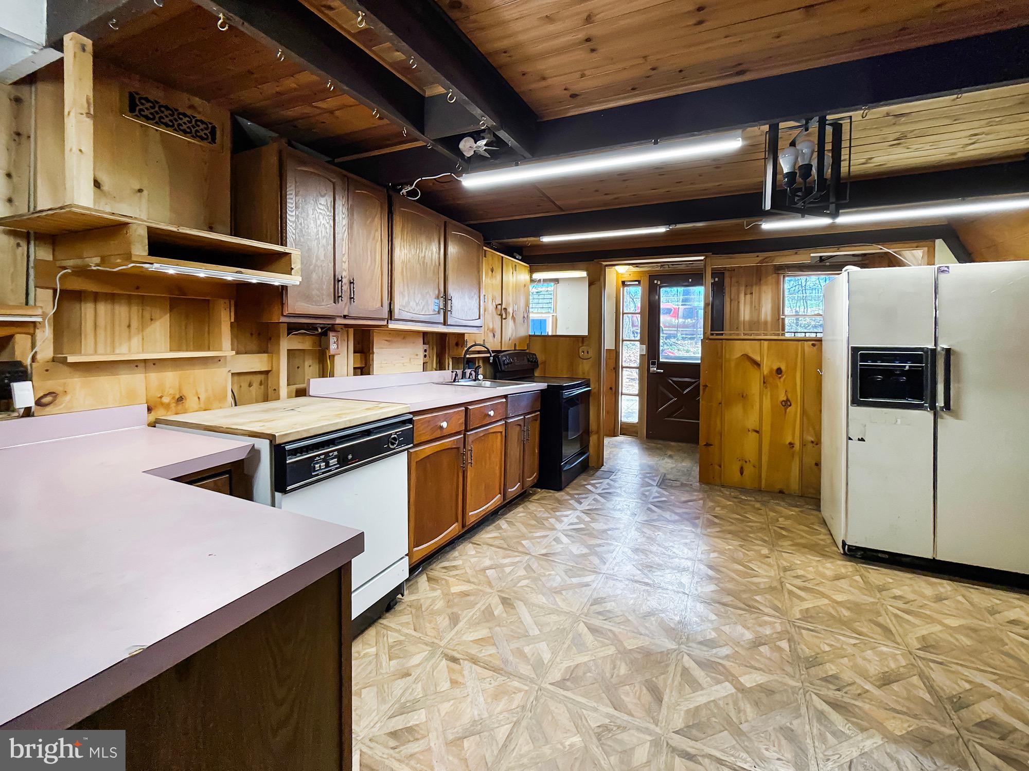 725 Funt Road Aspers, PA 17304 - Photo 5 of 33 a kitchen with stainless steel appliances granite countertop lots of counter top space