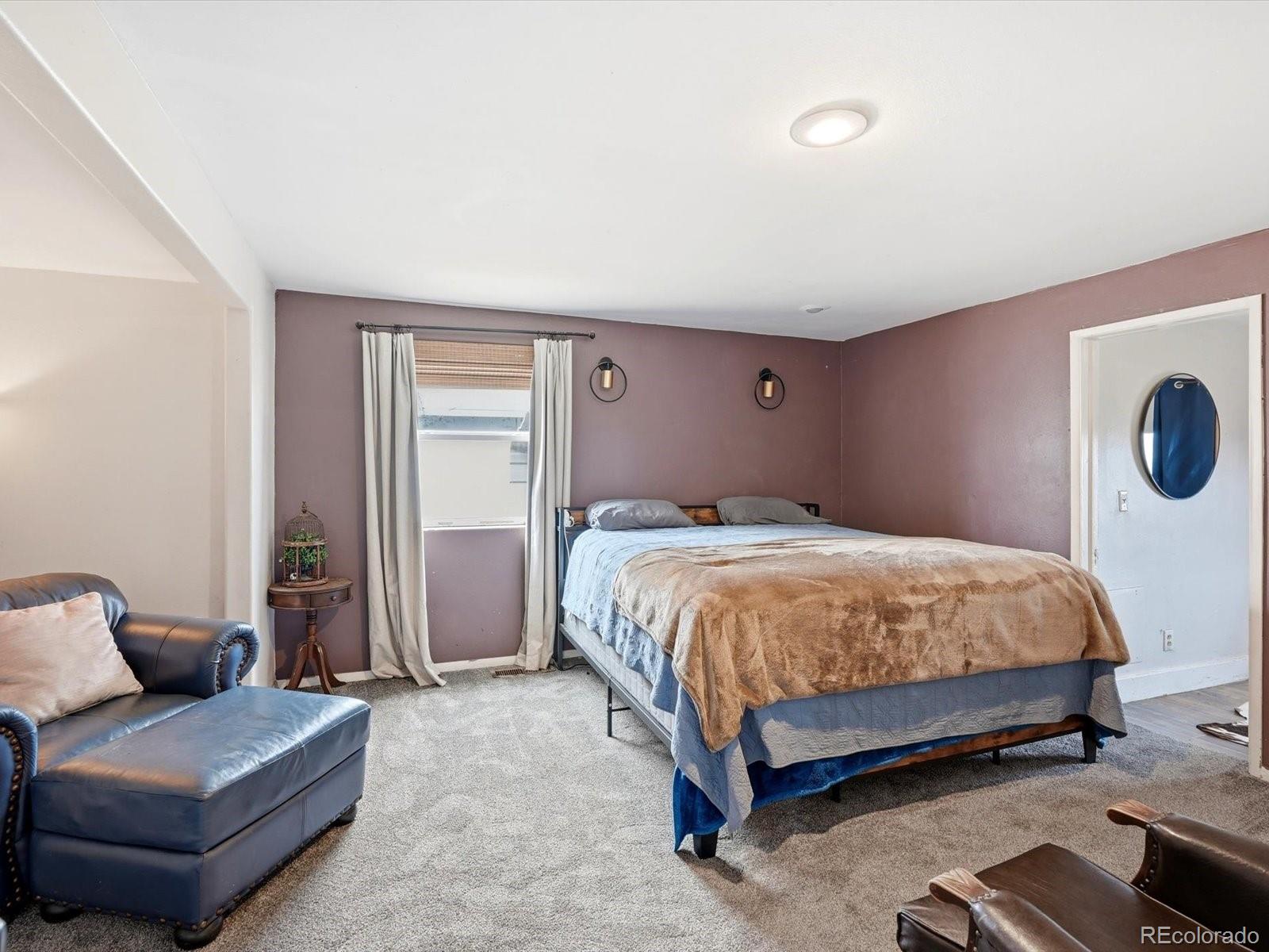 360 South 7th Avenue Brighton, CO 80601 - Photo 21 of 43 a spacious bedroom with a bed and window