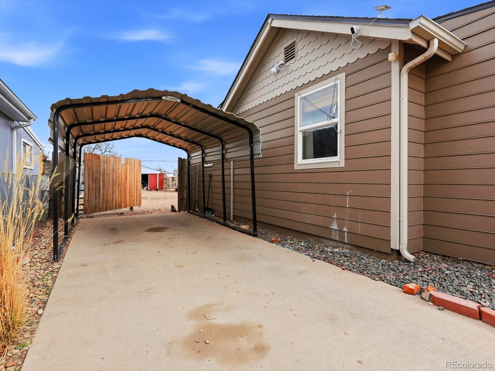 360 South 7th Avenue Brighton, CO 80601 - Photo 29 of 43 a view of a house with a garage