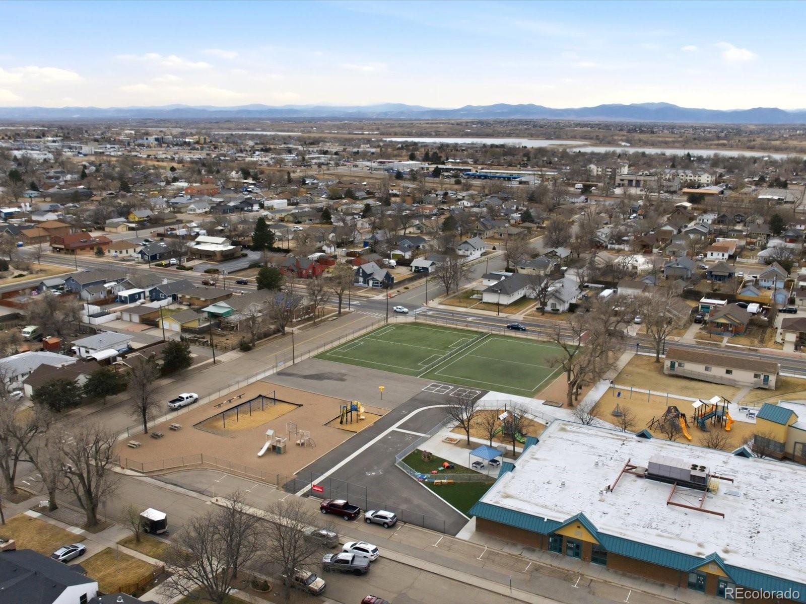 360 South 7th Avenue Brighton, CO 80601 - Photo 38 of 43 an aerial view of a city with lots of residential buildings