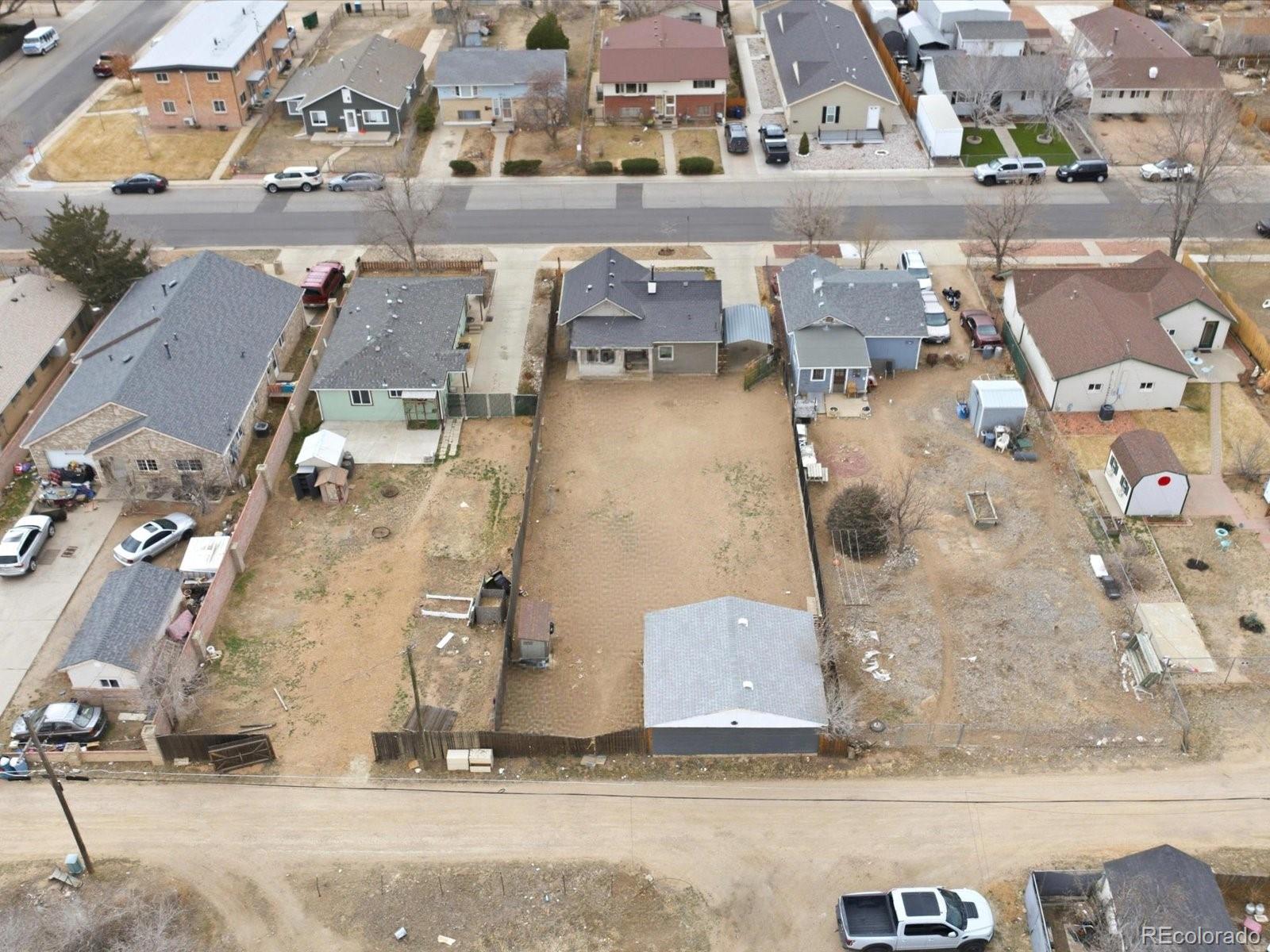 360 South 7th Avenue Brighton, CO 80601 - Photo 42 of 43 an aerial view of residential houses with outdoor space