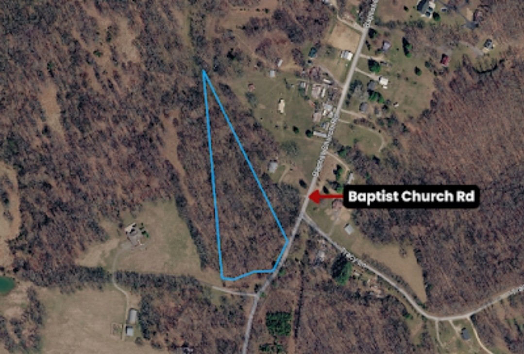 1 Baptist Church Road Culleoka, TN 38451 - Photo 10 of 11 a sign that is sitting on a wooden wall