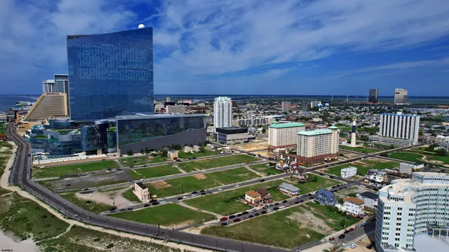 a front view of house with yard and outdoor seating