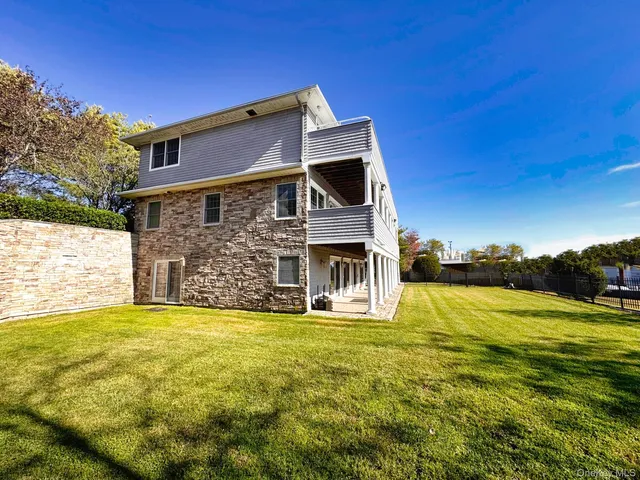 a view of a balcony with chairs