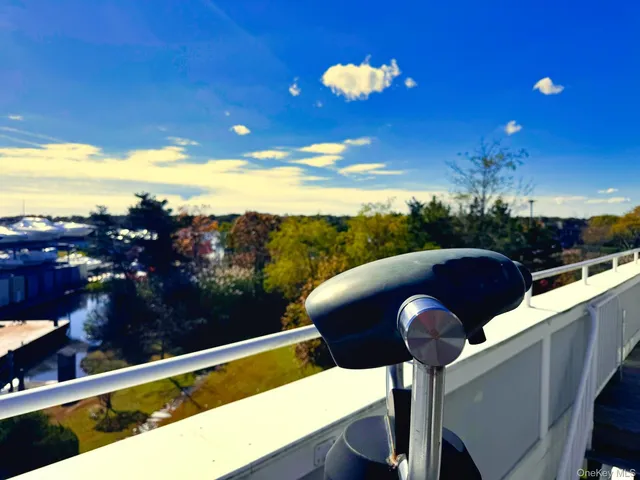 a view of a balcony with lake view and mountain view