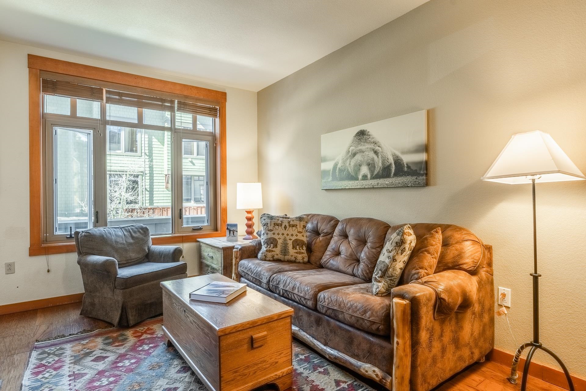 6201 Minaret Road, Unit 2220 Mammoth Lakes, CA 93546 - Photo 2 of 14 a living room with furniture and a large window