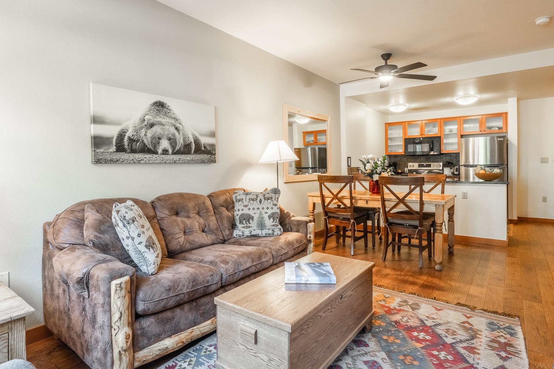 6201 Minaret Road, Unit 2220 Mammoth Lakes, CA 93546 - Photo 3 of 14 a living room with furniture and wooden floor