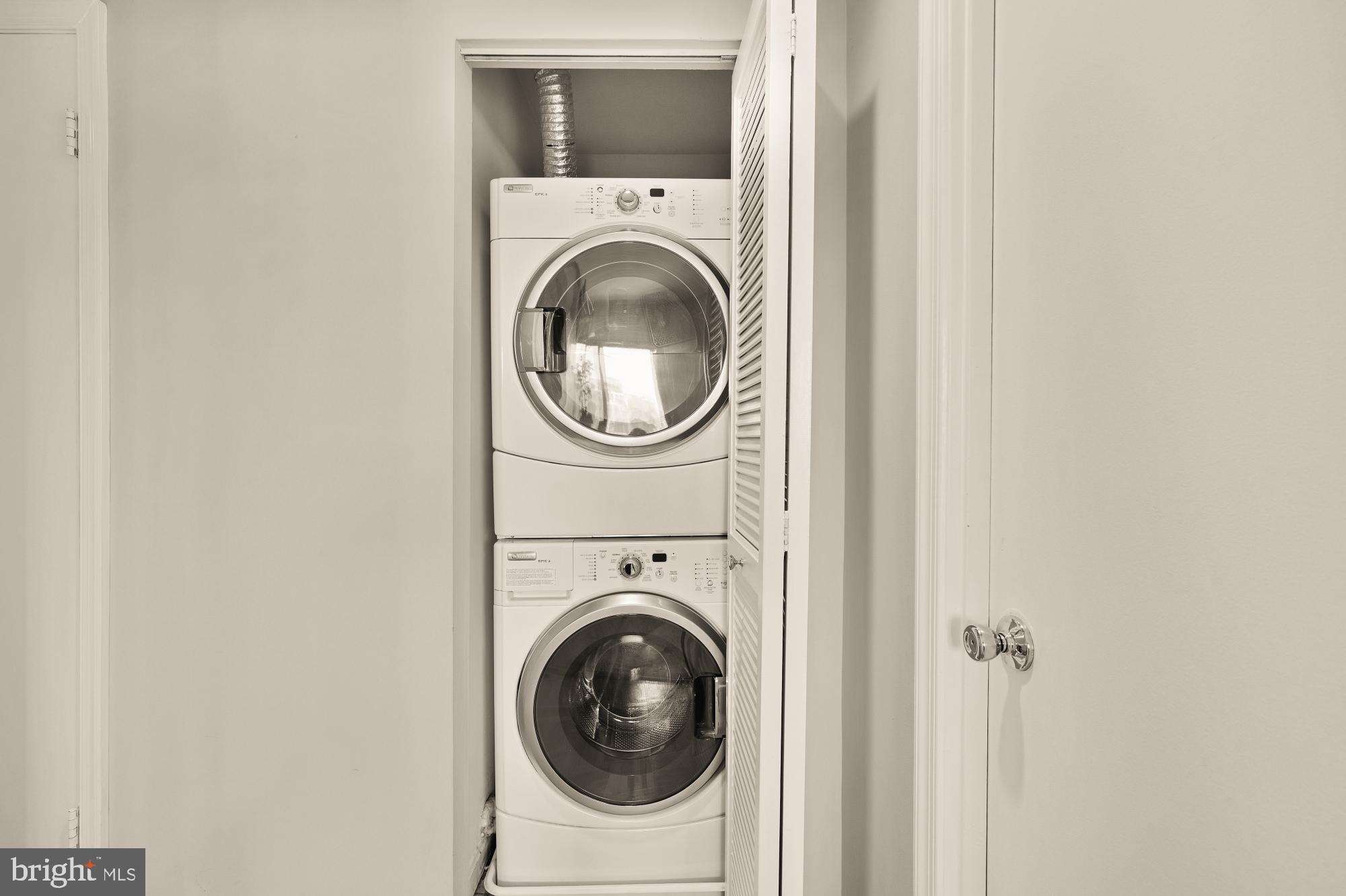 1715 15th Street Northwest, Unit 401 Washington, DC 20009 - Photo 16 of 28 a utility room with dryer and washer
