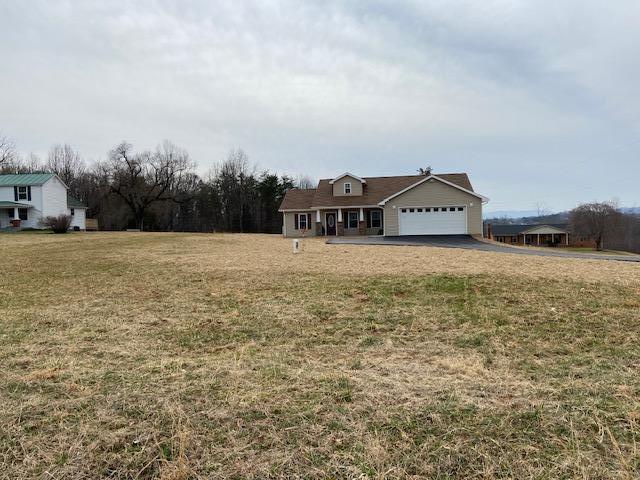 2103 Goodview Road Goodview, VA 24095 - Photo 14 of 17 a view of a field with trees in the background