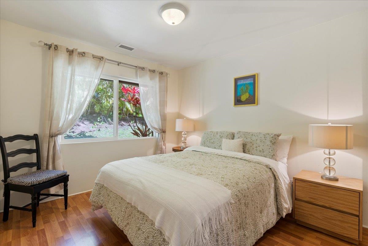 81 Lae Street Paia, HI 96779 - Photo 34 of 47 a bedroom with a bed and a window