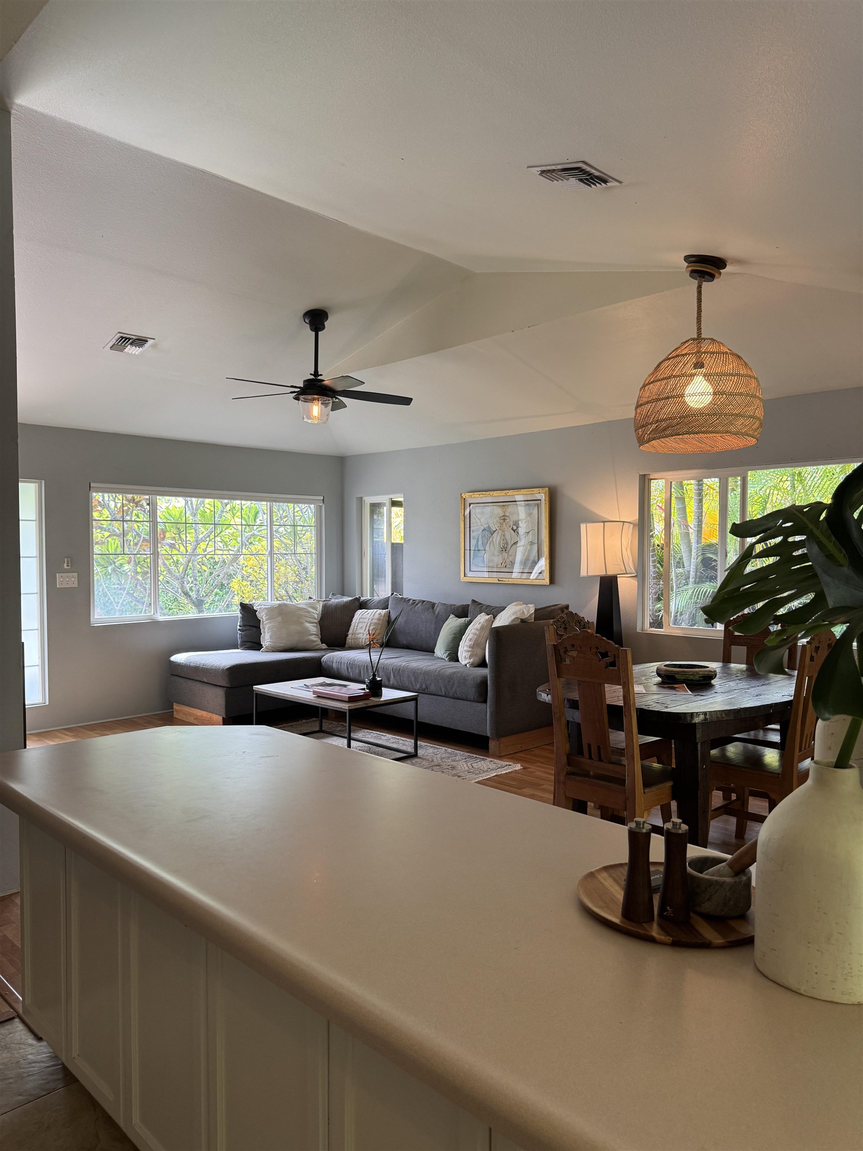 81 Lae Street Paia, HI 96779 - Photo 45 of 47 a living room with lots of furniture and chandelier