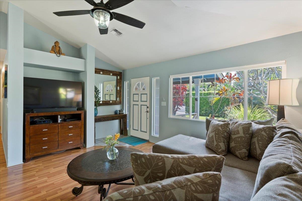 81 Lae Street Paia, HI 96779 - Photo 10 of 47 a living room with furniture and a flat screen tv