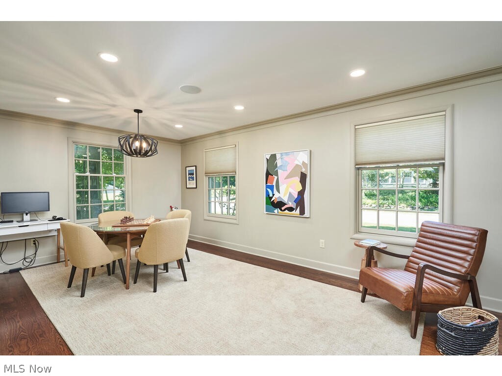 251 Overwood Road Akron, OH 44313 - Photo 16 of 40 Living room addition with HW floors & crown molding