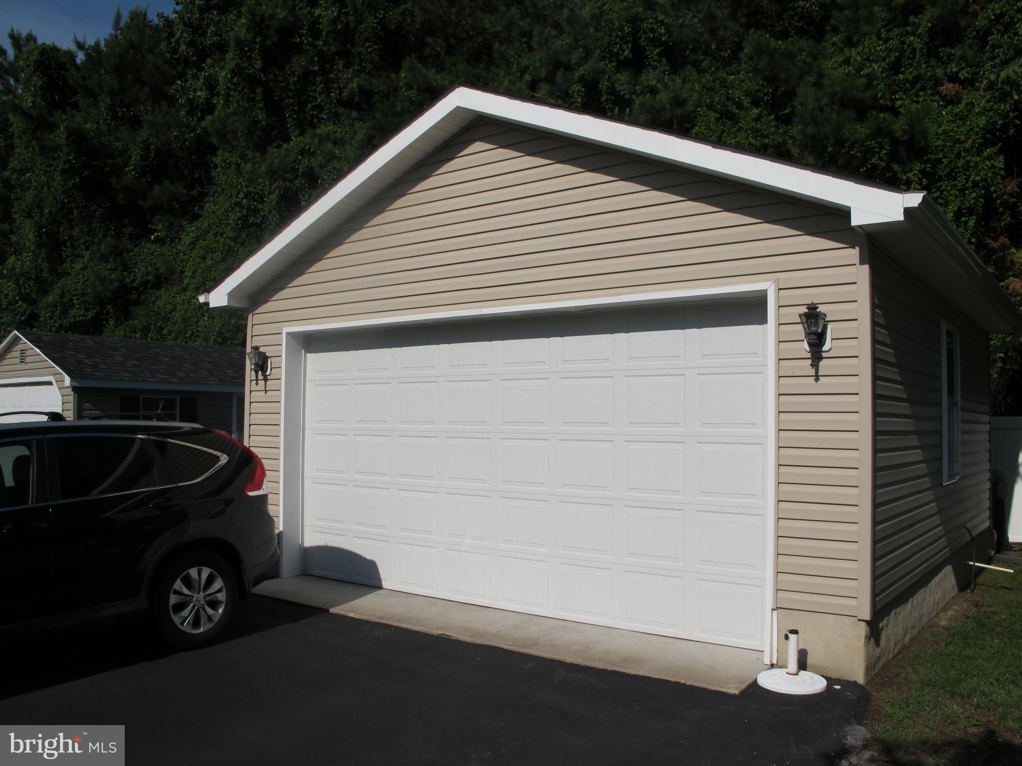 107 Rolando Drive Colonial Beach, VA 22443 - Photo 8 of 30 Garage in back inside privacy fence.