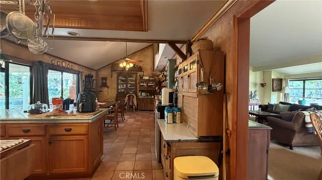 a view of a livingroom with furniture and windows