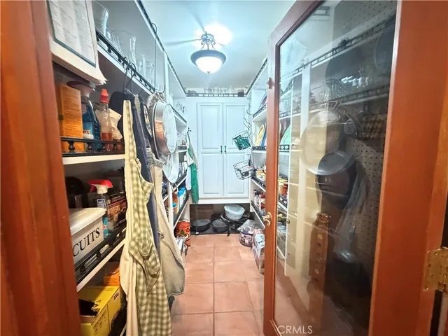 a view of a bathroom with dual sinks