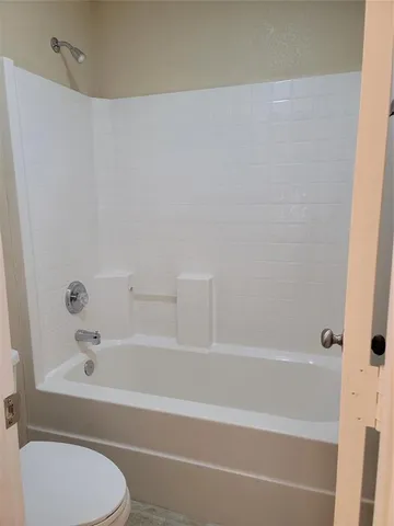 a view of a backyard with a small cabin