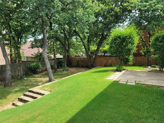 a view of a backyard with a garden