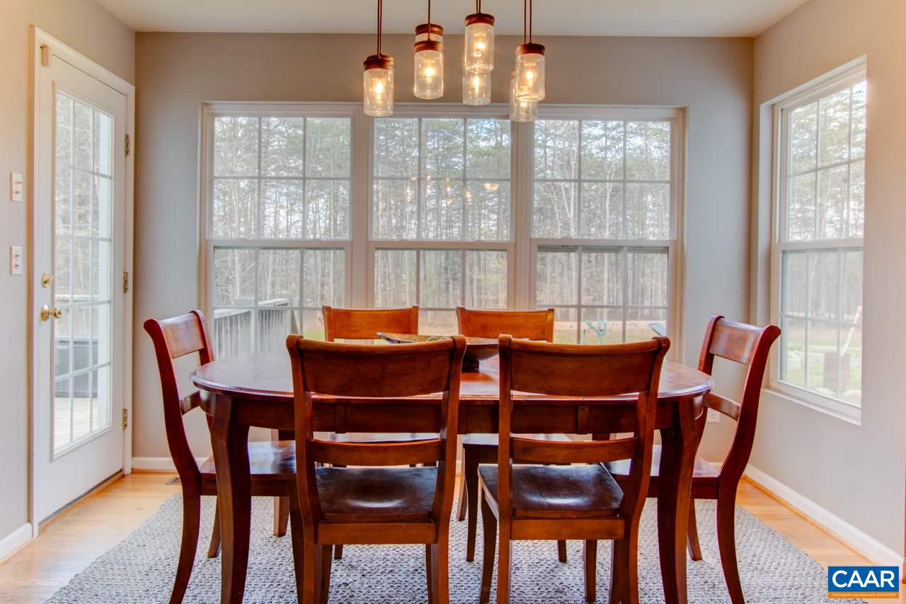 1319 Troy Road Troy, VA 22974 - Photo 12 of 41 a dining room with furniture and window