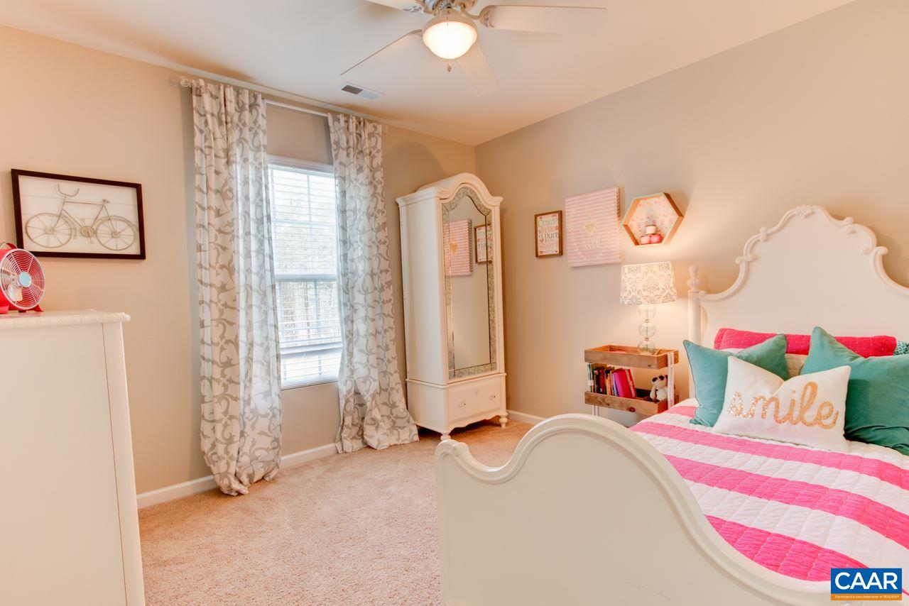 1319 Troy Road Troy, VA 22974 - Photo 24 of 41 a bedroom with a bed and a window