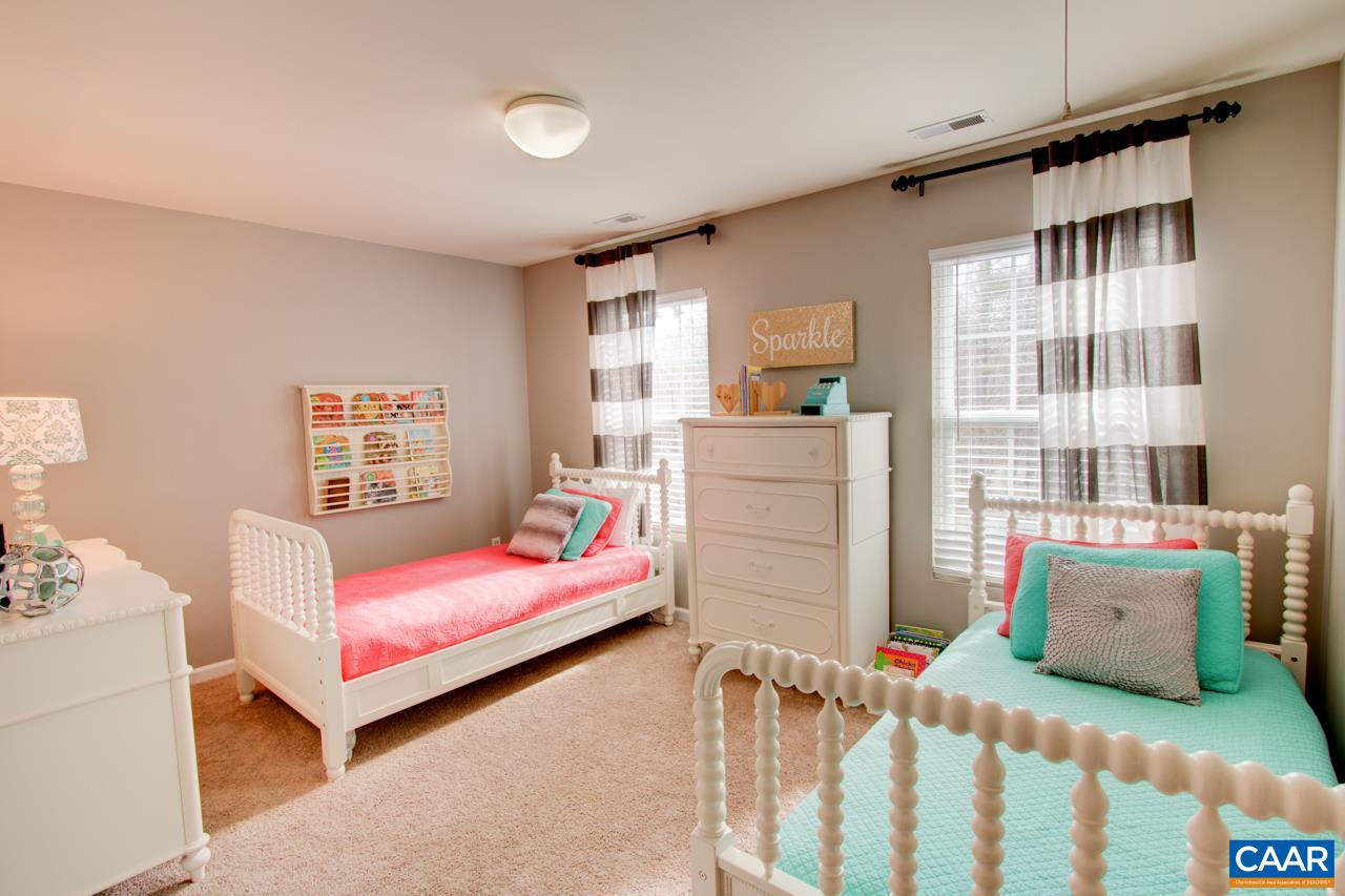 1319 Troy Road Troy, VA 22974 - Photo 25 of 41 a bedroom with furniture and a window