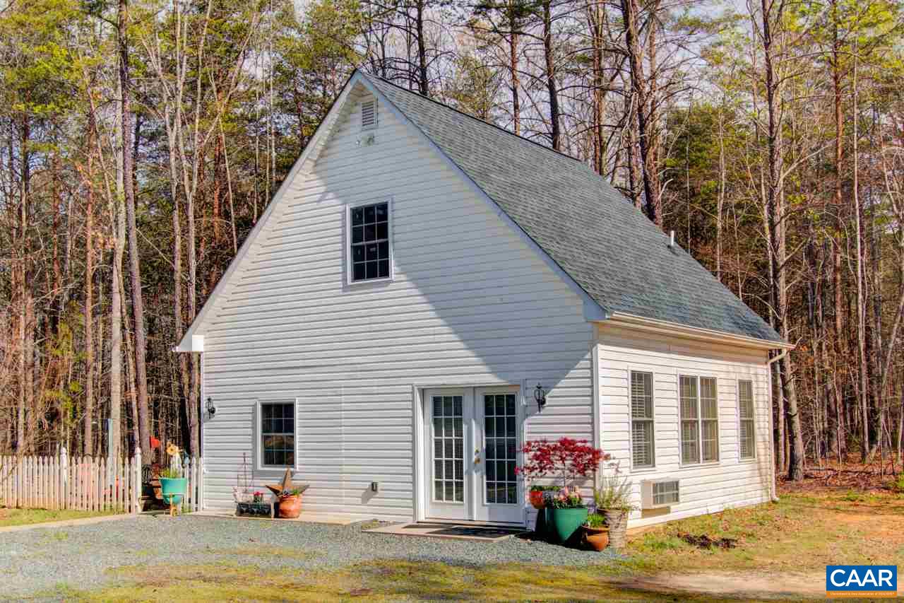 1319 Troy Road Troy, VA 22974 - Photo 31 of 41 a front view of a house with garden