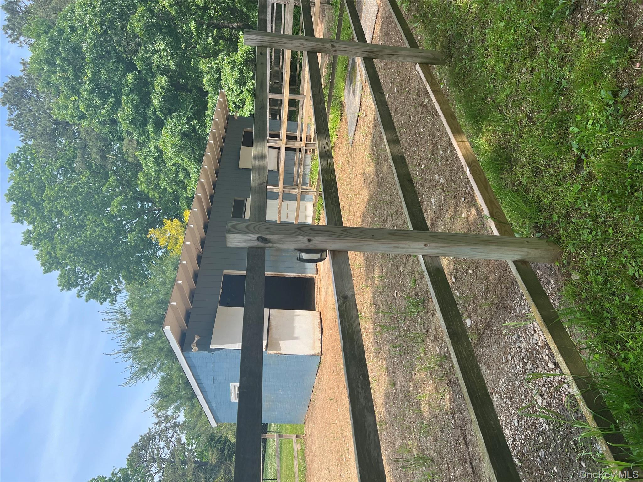 10 Jonah Road Miller Place, NY 11764 - Photo 15 of 16 a view of a house with a yard
