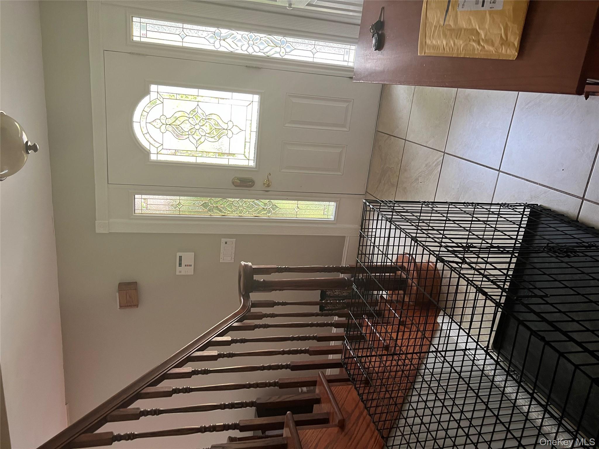 10 Jonah Road Miller Place, NY 11764 - Photo 5 of 16 a view of entryway with wooden floor