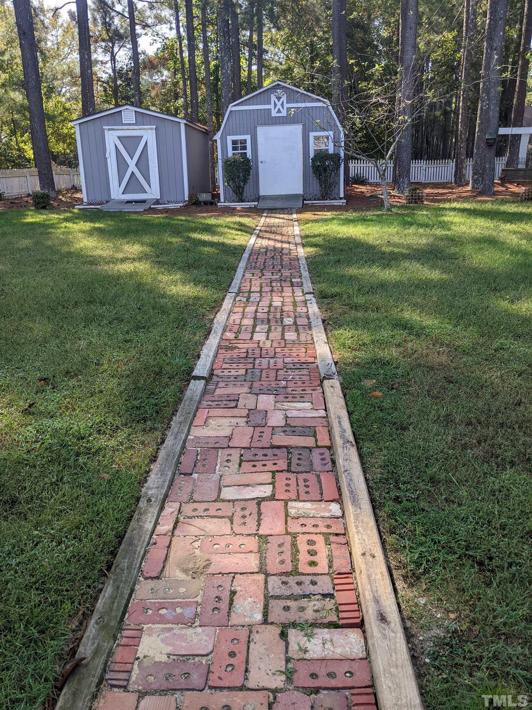 1629 Tall Cane Circle Willow Spring, NC 27592 - Photo 23 of 23 a front view of house with yard