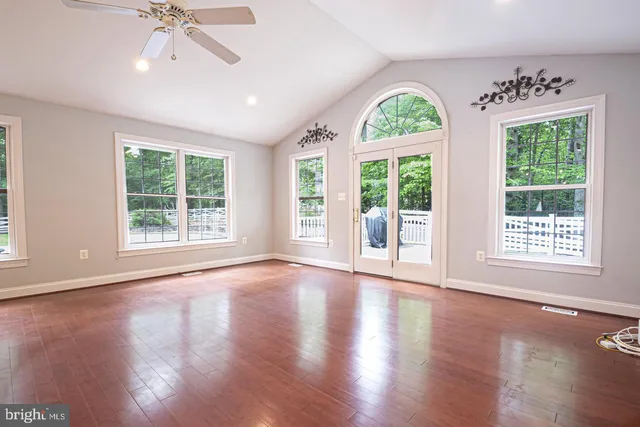 a view of entryway with wooden floor