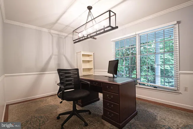 a view of a hallway with staircase