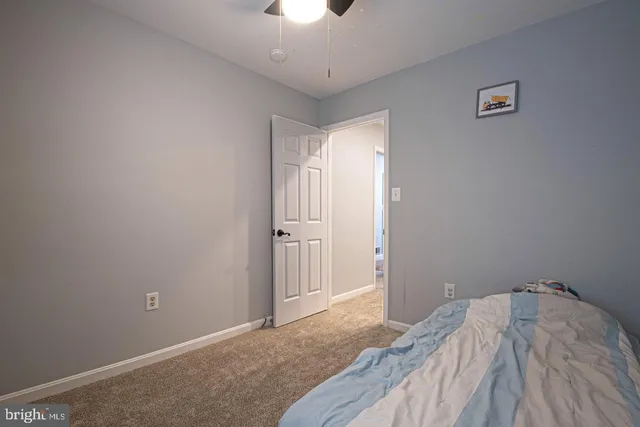 a bathroom with 2 sink and a mirror