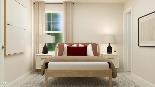 a bed room with a bed and a chair