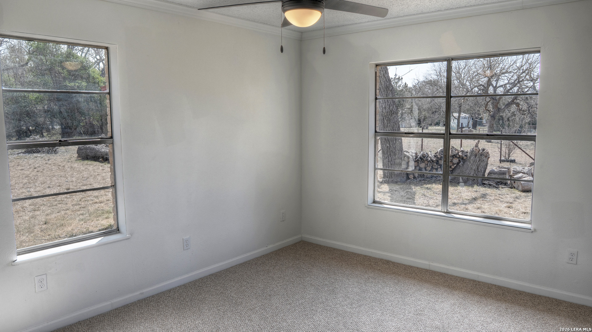 311 Patterson Creek Road Leakey, TX 78873 - Photo 12 of 16 an empty room with a window