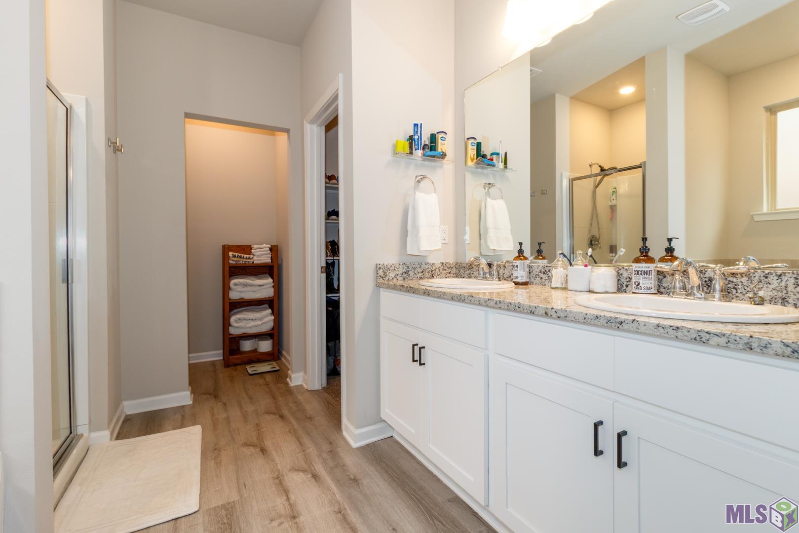 6407 Tiger Pointe Dr. St. George, LA 70817 - Photo 11 of 23 Primary bathroom
