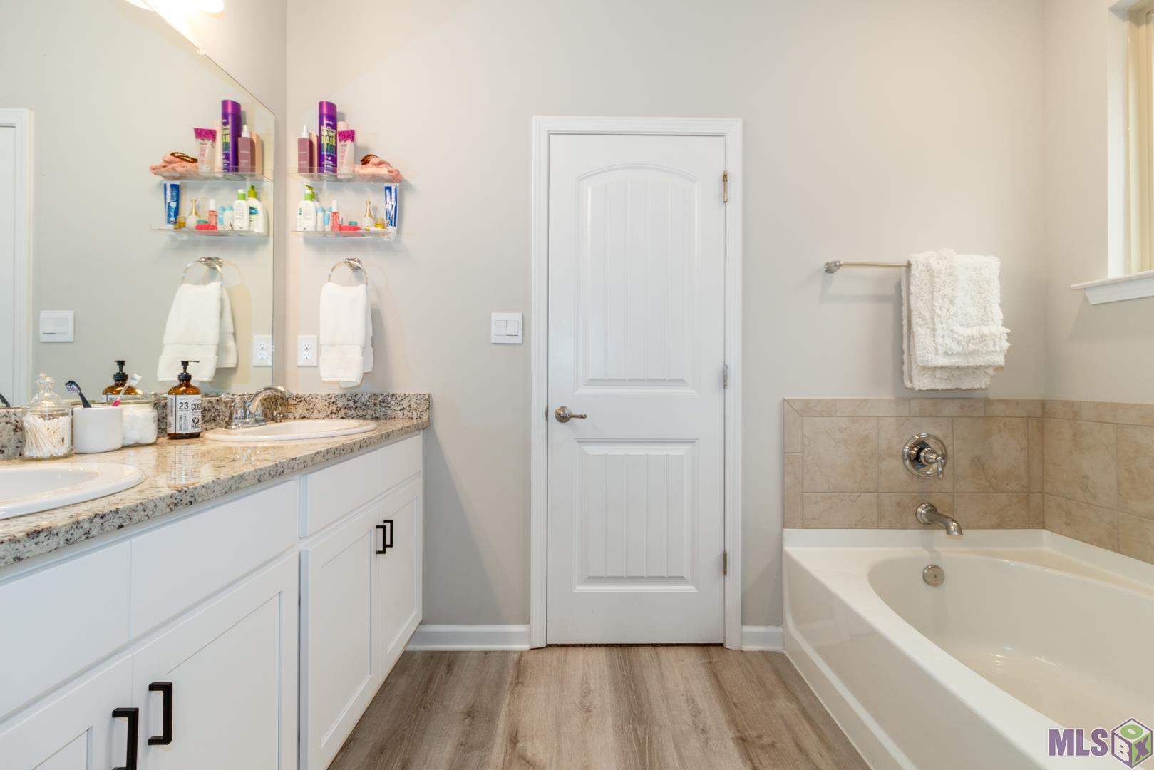 6407 Tiger Pointe Dr. St. George, LA 70817 - Photo 13 of 23 Guest bathroom