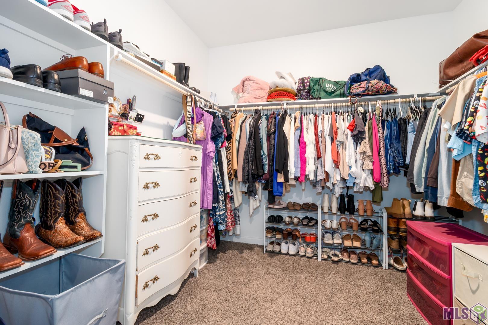 6407 Tiger Pointe Dr. St. George, LA 70817 - Photo 13 of 23 Walk in closet off of primary bathroom